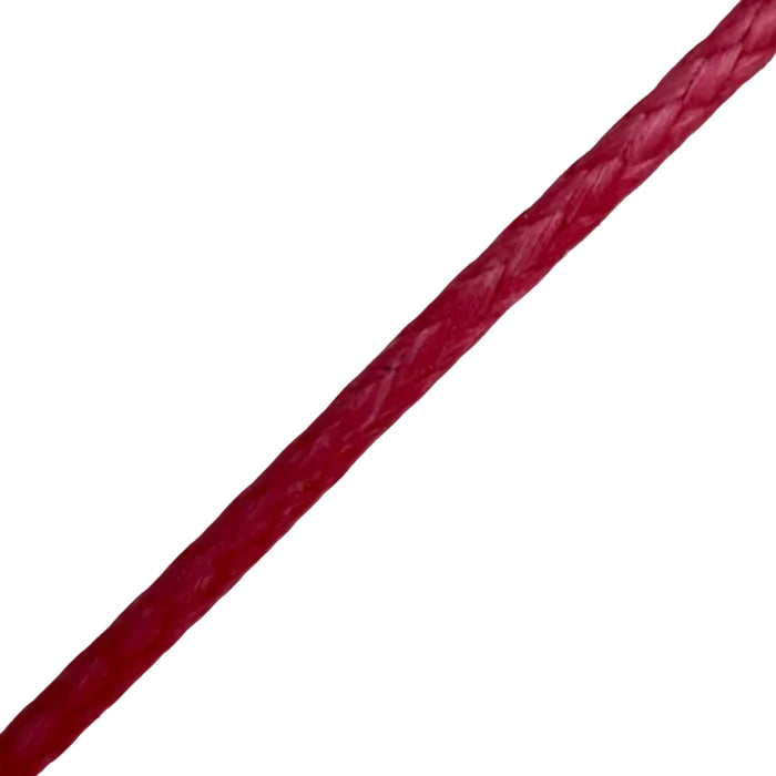 Close-up of a red cable on a gray background