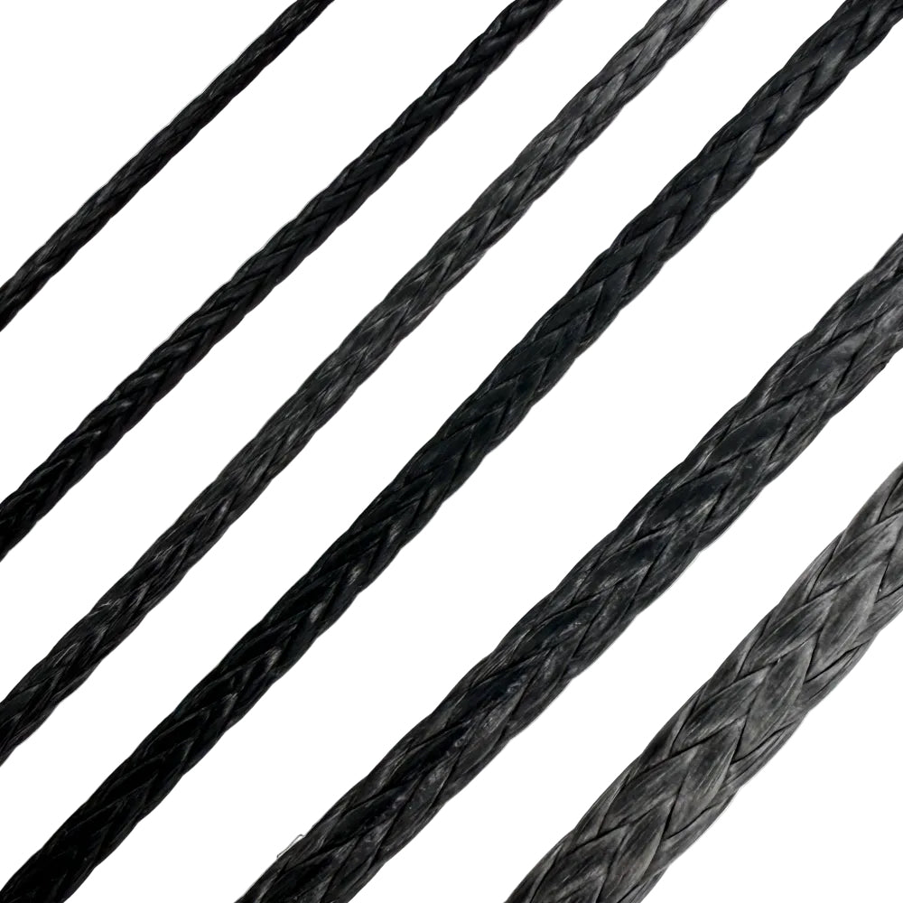 Close-up of black braided cord on a white background