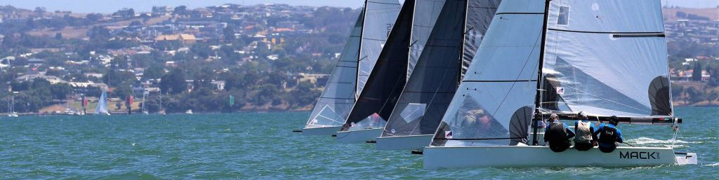 VX One called 'Mack One' sailing upwind in letterbox format.